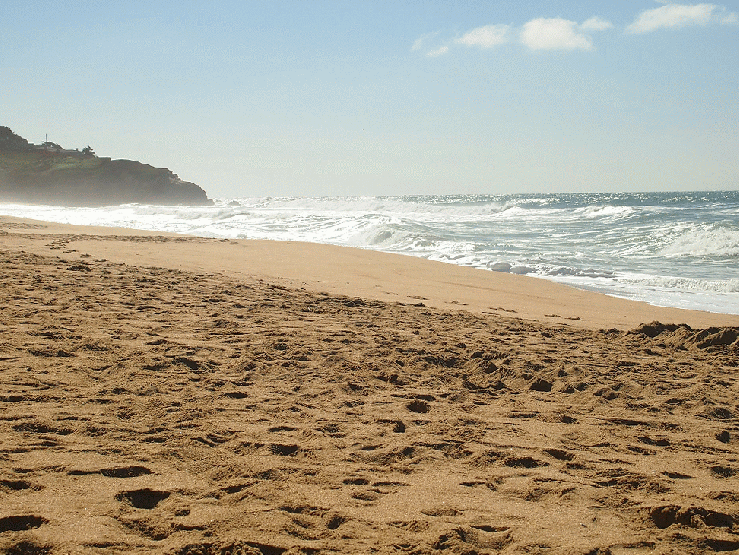 Surf and sand at Montara State Beach